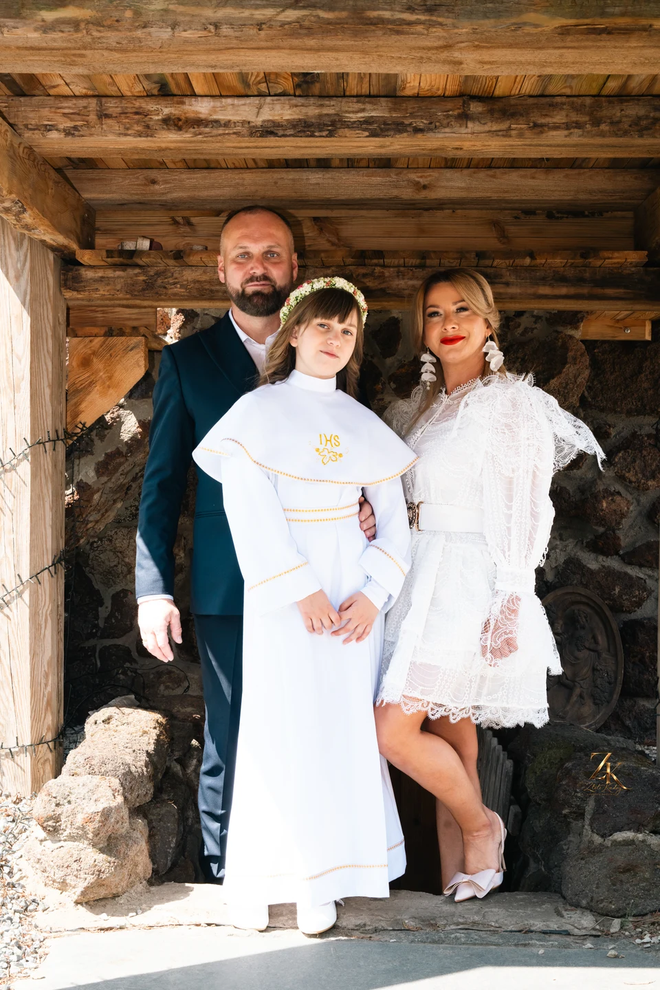 Portret rodzinny na tarasie — Komunia Antosi
