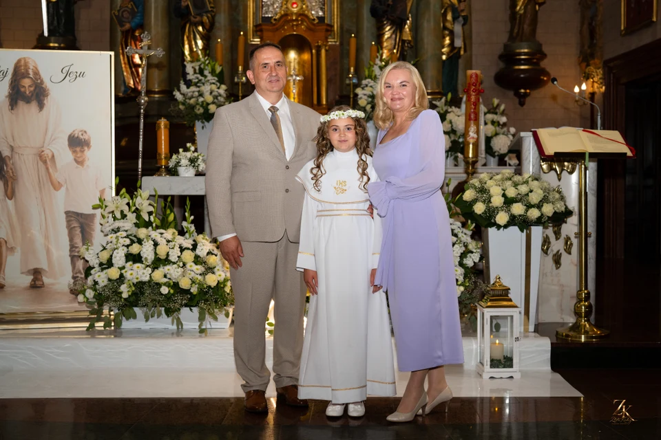 Rodzinny portret w kościele — Komunia Marysi